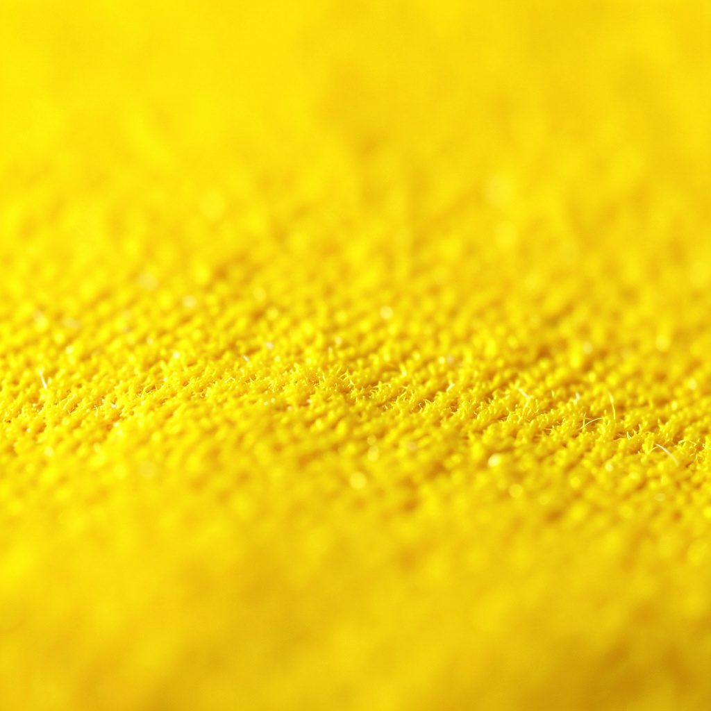 Bright yellow casino chip pattern with rich black accents